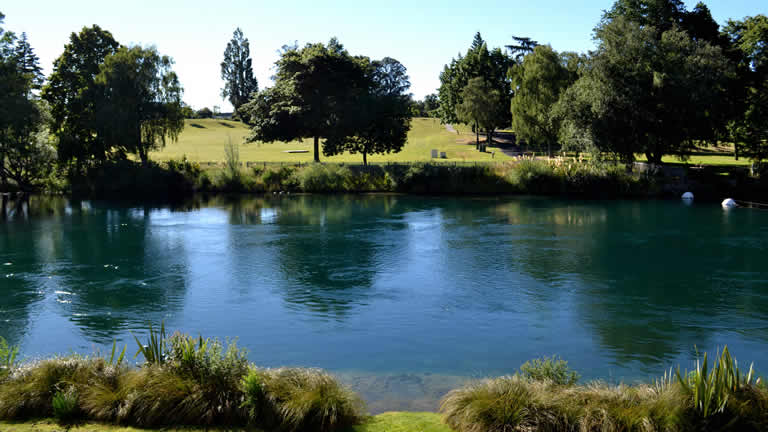 Taupo Domain from Riverside Apartment dining and living area over the Waikato river